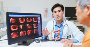 doctor explains colonoscopy exam